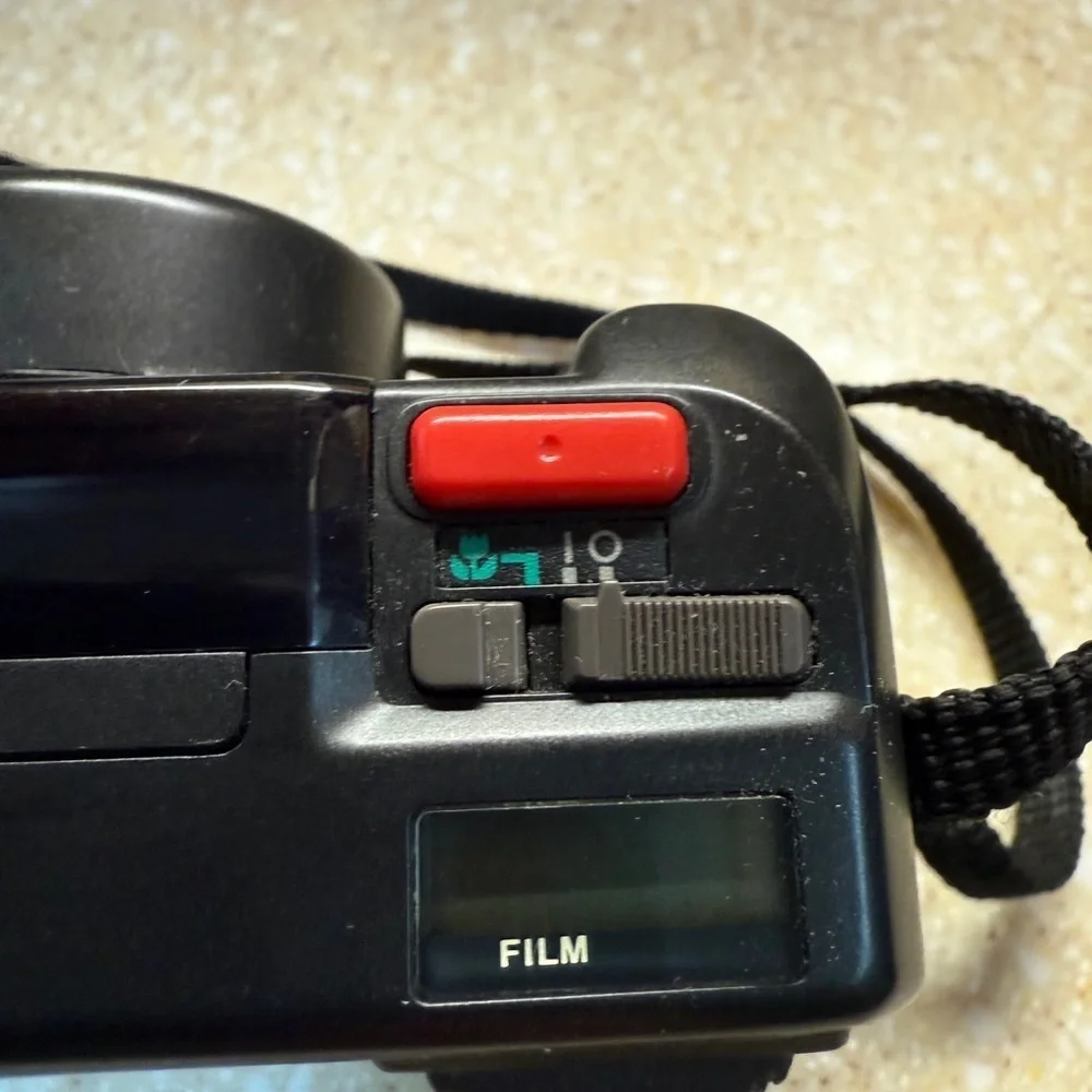 Pentax IQ Zoom 70 Black Macro 35mm Compact Point and Shoot with strap Camera